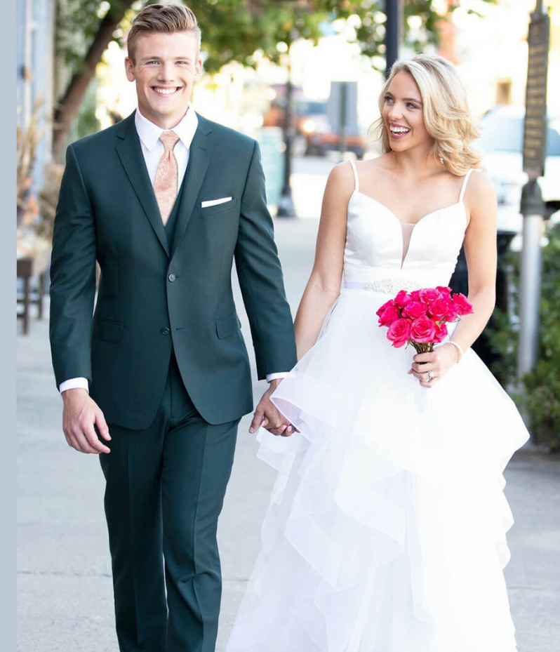 Male models wearing gray tuxedos